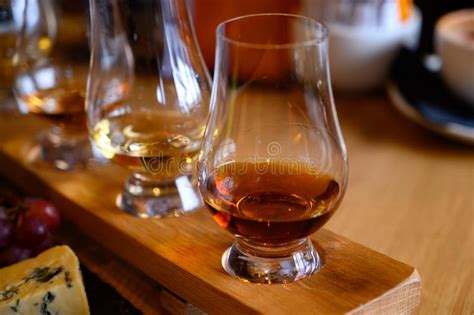 Flight Of Scottish Whisky Tasting Glasses With Variety Of Single Malts