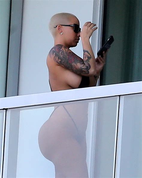 Amber Rose Shows Off Her Round Ass Wearing A Tiny Black Monokini On A