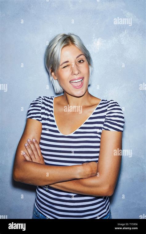 Cheaky Young Woman Making Funny Faces Stock Photo Alamy