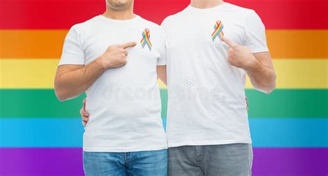 close up of couple with gay pride rainbow ribbons stock image image of pride gender 115591837