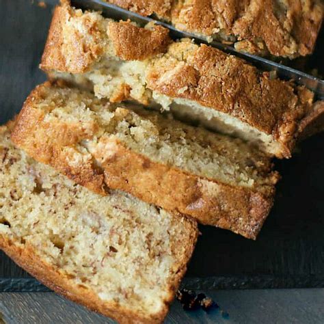 In a large mixing bowl, add bananas and mash with a masher. BEST EVER Sour Cream Banana Bread Recipe - Reluctant ...