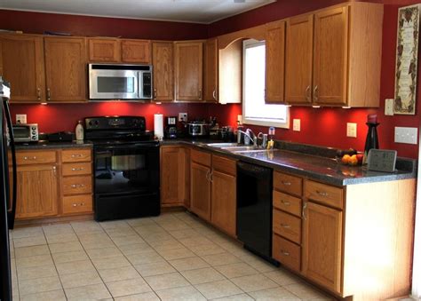 Below are 20 best pictures collection of kitchen backsplash with oak cabinets photo in high resolution. red and brown kitchen theme - Google Search | Red kitchen ...