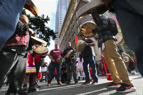 Native Americans March Through Downtown Seattle To Celebrate Indigenous