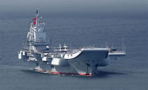 How Big Is Liaoning Chinas First Aircraft Carrier Celebrated In Hong Kong