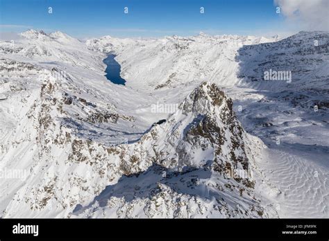 Aerial View Of Snowy Peak Peloso Surrounded By Lago Di Lei Val Di Lei