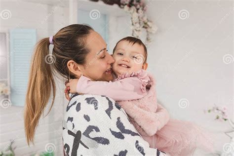 tenderness love in relationship between mom and daughter 1 year ncept of intimacy of hugs