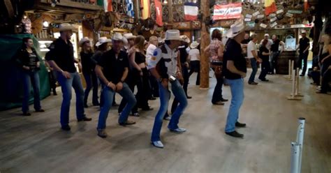 Country Line Dancers Cross The Line And Dance To The Hip Hop Version Of