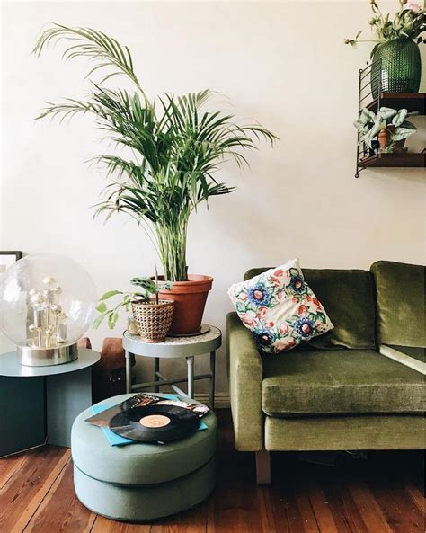 Several shades of green appear on this room's mantel, accent chair, and pillows, but the effect is subtle and organic. living room | interior design | decoration | olive green ...