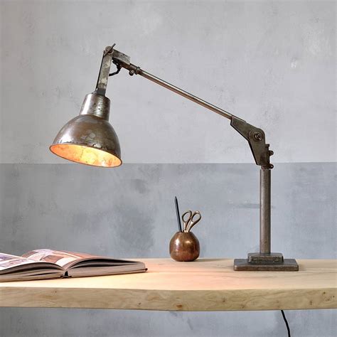 Anglepoise desk lamps provide more than just your standard lighting fixture as their patent constant tension spring technology and vintage, minimalist design bring functionality and style into a harmonious relationship while also providing a necessary function. industrial angle poise desk lamp by industrial by design | notonthehighstreet.com