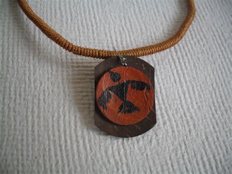 coconut-shell-pendant-with-necklace-tribal-art-design-tribal-art-designs,-tribal-art