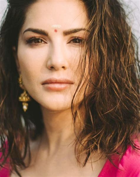Sunny Leone Goes Bold Once Again Wears A Pink Blouse For A Wet Look In Latest Photoshoot