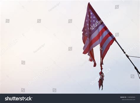 Torn American Flag On Sky Background Stock Photo 1198390969 Shutterstock