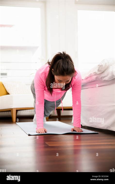 Woman Doing Push Ups Stock Photo Alamy