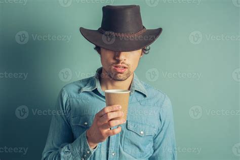 Cowboy Drinking Coffee 935360 Stock Photo At Vecteezy