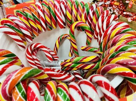 Colorful Candy Canes In Bucket In The Shop Stock Photo Image Of