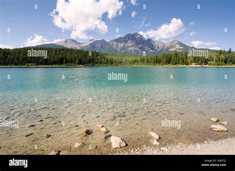 Reflections On Patricia Lake In Jasper In Canada Stock Photo Alamy