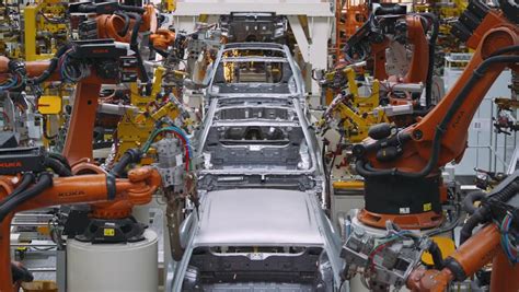 Robots Weld Car Parts In Production Line At Factory Stock Footage Video