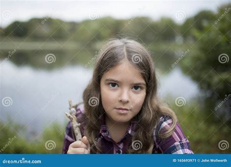 Girl With Very Serious Look In Outdoor Setting Stock Image Image Of Trouble Space 165693971