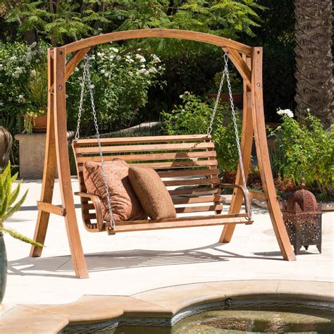 Nautic wooden swing is a fun activity for children and great getaway for adults. Noble House Tulip 76in. 2-person teak stained Wood Patio ...