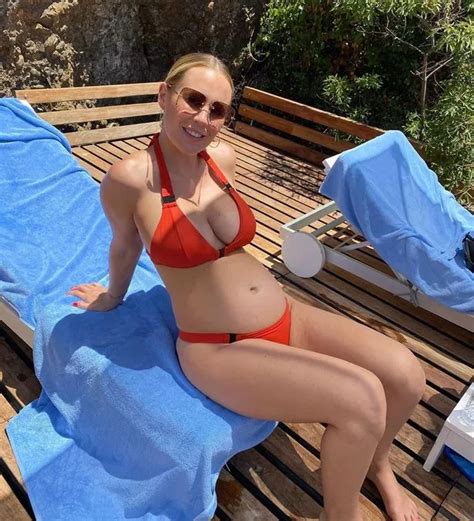 Kate Ferdinand Shows Growing Baby Bump In Red Bikini With Fans