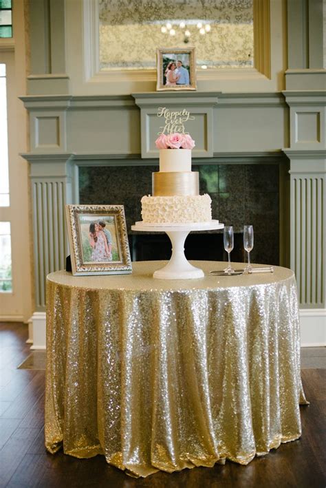 Beautiful Wedding Cake Display On A Sequined Table Cloth