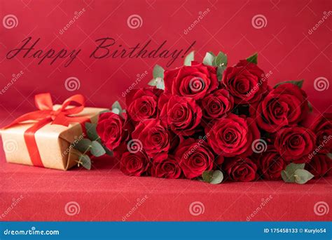 Beautiful Bouquet Of Red Roses With Gift Box On The Red Background Happy Birthday Greeting