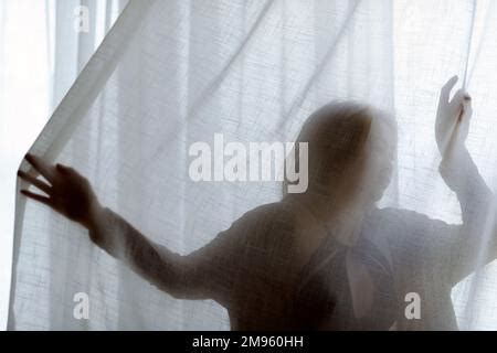 Figure Of A Naked Woman Behind A Transparent Curtain Stock Photo Alamy