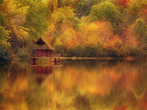 Wooden Cabin On Lake In Autumn Crosswalks To Nowhere