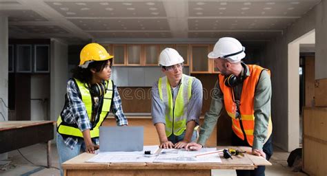 Engineer Team Planning And Discussing About Construction Building On