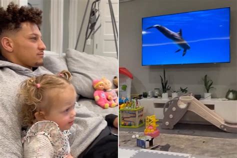 Patrick Mahomes And Daughter Sterling Cuddle Up To Watch Animal Planet