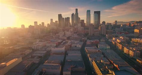 Sun Rising Over Los Angeles City Skyline In Time Lapse Stock Footage