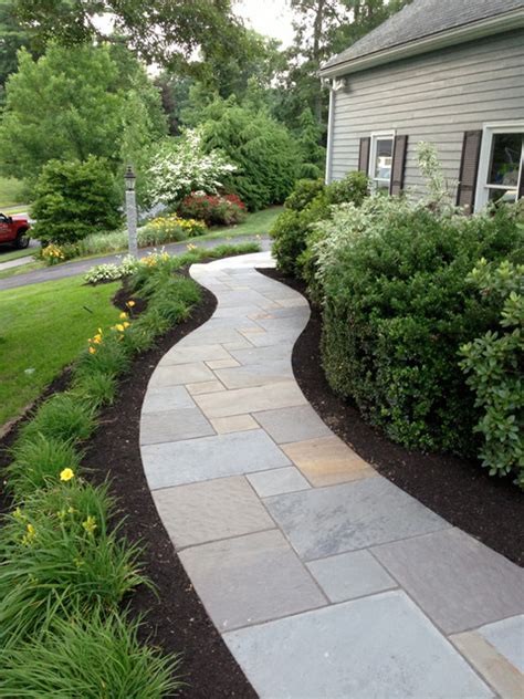 Curving Bluestone Walkway With Radius Granite Steps Transitional