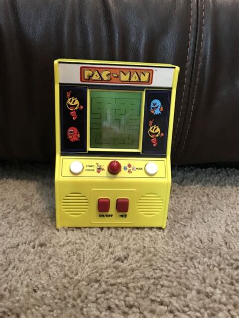Classic Arcade Pac Man Handheld Game Basic Fun 09521 Pacman Video