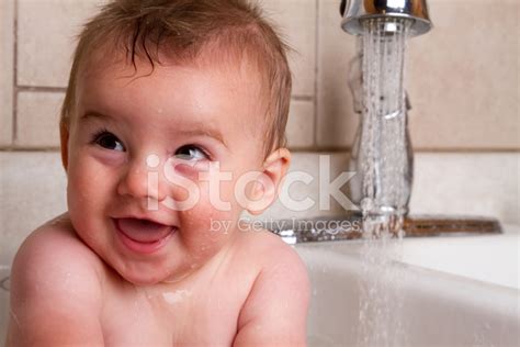 Cute Baby Boy Bathing In Kitchen Sink Stock Photo Royalty Free