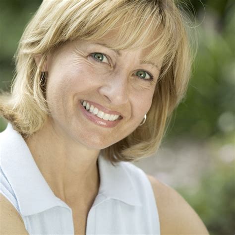 A Mature Woman Smiling Smile Quest Dental