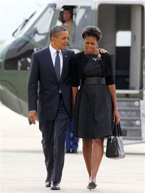 Barack Put His Arm Around The First Lady As They Make Their Way To Barack And Michelle Obama