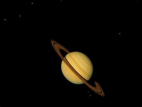 Voyager 1 Photo Of Saturn And Six Of Its Moons Photograph By Nasascience