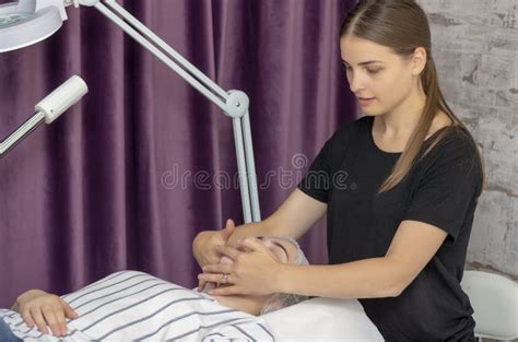 Young Woman Getting Facial Massage At Spa Salon Stock Image Image Of Professional Healthy