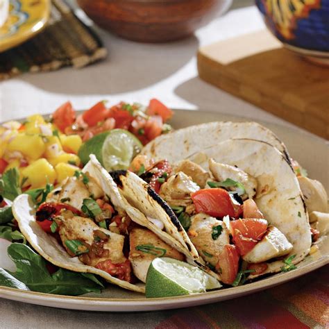 Heat canola oil in a large skillet over medium high heat. Chicken Tacos with Charred Tomatoes Recipe - EatingWell