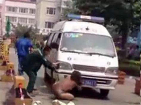 Naked Chinese Woman Blocks Ambulance After Hitting Husband S Mistress