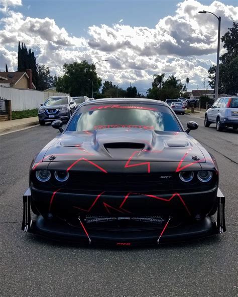 These cars are not interchangeable, though. Dodge Challenger Batmobile Looks Massive, Has Twin-Turbo ...