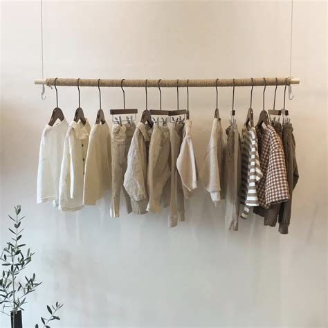 @𝓈𝑒𝓇𝑒𝓃𝒾𝓉𝓎𝒾𝓃𝓈𝓅𝒶𝒸𝑒 | Aesthetic stores, Clothing rack, Wooden decor