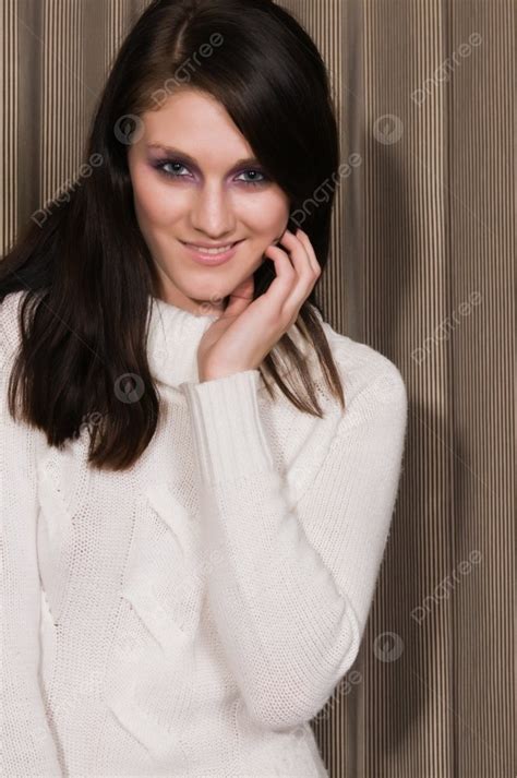 Pretty Young Brunette In A White Knit Sweater Photo Background And Picture For Free Download