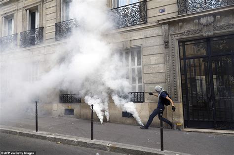 Riot Police Fire Tear Gas And Water Cannons In Paris As Thousands