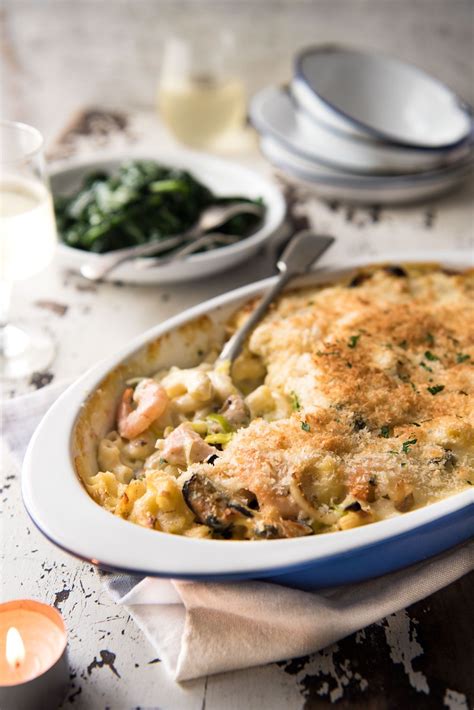 At its core, this dish's some egg fried rice smothered with seafood and bechamel, topped with cheese… then briefly tossed in the oven for a. Creamy Seafood Pasta Bake | Recipe | Pasta bake, Seafood ...