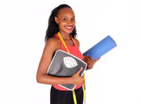 Fit Woman With Tape Measure Yoga Mat And Weigh Scale