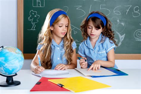Kids Students In Classroom Helping Each Other Stock Image Image Of