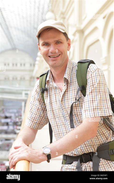 Tourist With Backpack In The Passage Department Store Stock Photo Alamy