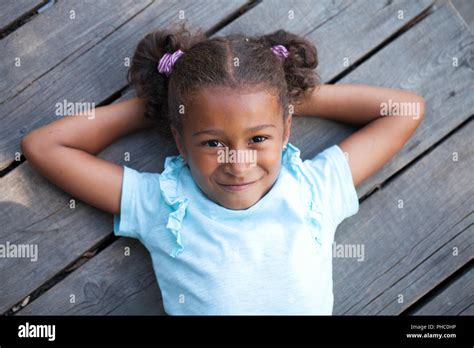 Close Up Portrait Of Pretty Mixed Race African American Little Girl