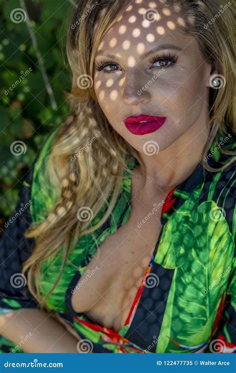 Hot Blonde Brazilian Model Posing Outdoors Against A Field Of Plants Stock Image Image Of